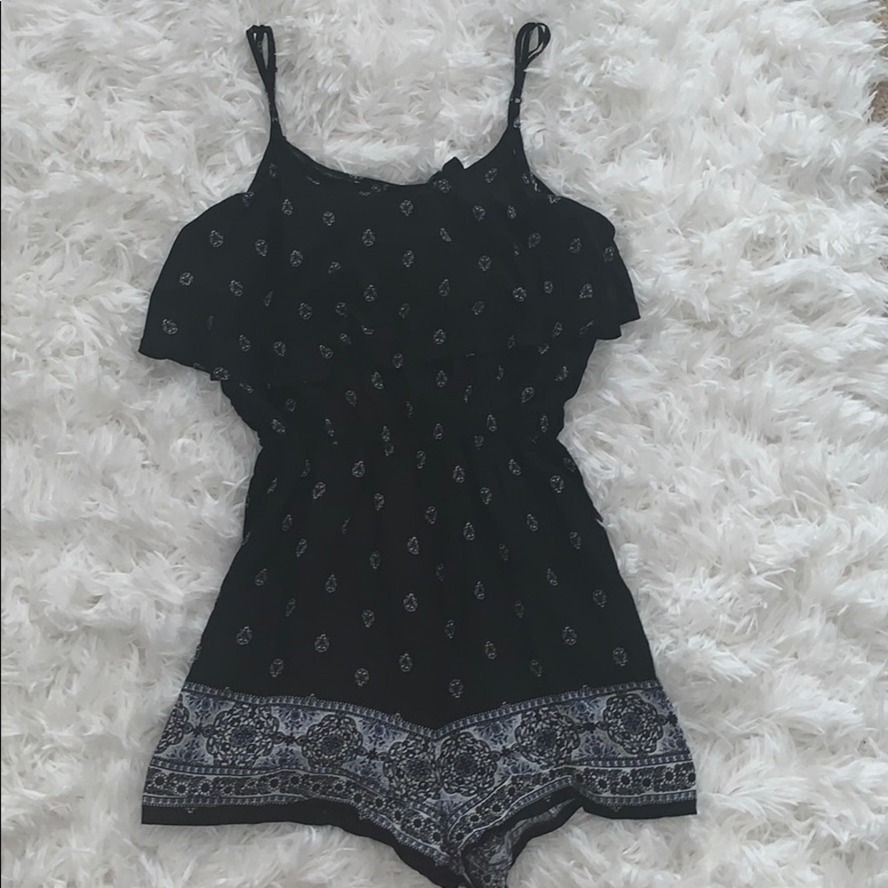 Black ruffled romper
